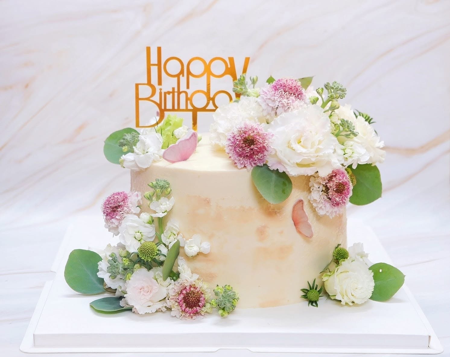 Birthday cake with garden flowers