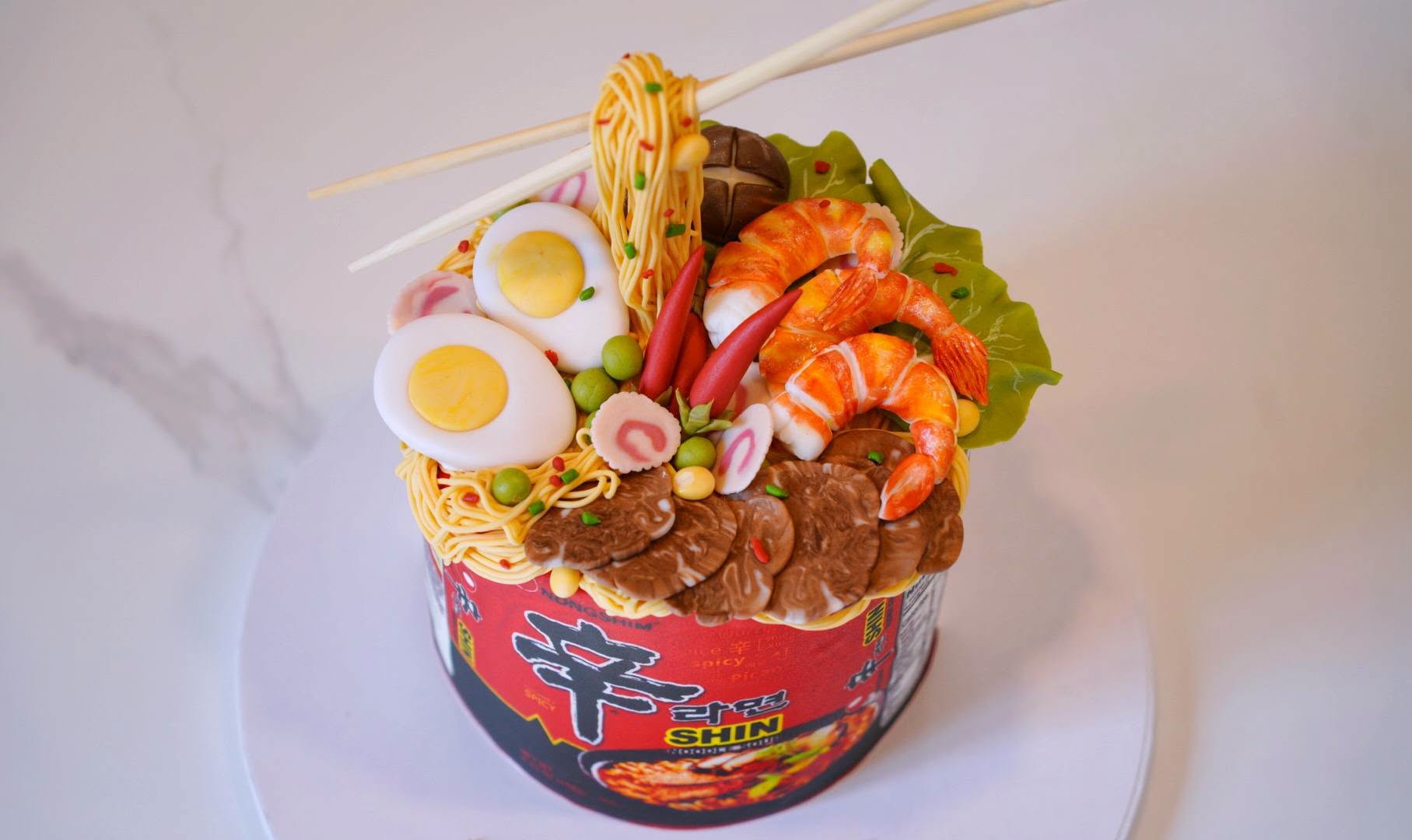 Cake sculpted to look like a ramen bowl