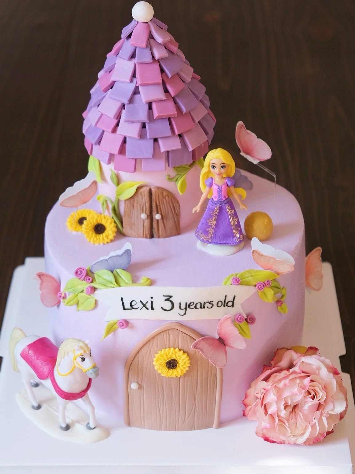 Rapunzel tower fondant cake